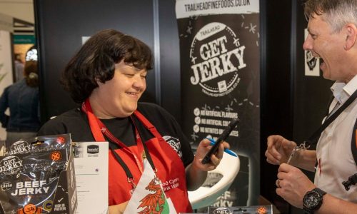 Our sales director, Emma, at event with happy customer